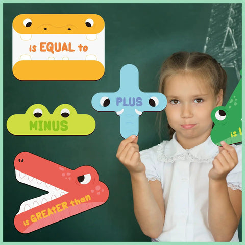 Child holding Five Animal Math Magnets For Classroom Teaching Kit Kid Friendly With Greater Than Less Than Plus Minus and Equal To Signs