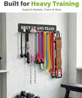 Built Like A Tank Wall Mounted Workout Gear Organizer Rack With Eight Heavy Duty Hooks For Hanging Barbells Resistance Bands Jump Ropes And Belts In Garage Or Home Gyms.