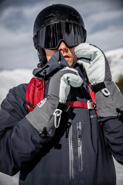 Person wearing Army Leather Heli Ski Glove For Freeride Skiing And Mountaineering, Classic 3 Finger Snow Mitt In Red, Size 7.