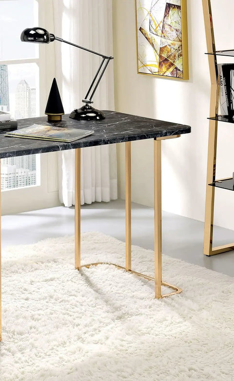 Adjustable Standing Computer Desk With Built Storage And Power Port, Sleek Faux Marble Work Table For Home Office, Gold Metal Frame close-up view with lamp and decor.