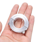 Hand holding Top-Notch Aluminum Double Split Clamp-On Shaft Collar for 1-Inch Shafts, part of 4-pack set, showing secure set screws
