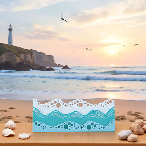 Beach Wave Metal Cutting Dies Set For Scrapbooking And Card Making on a sandy beach with ocean background, summer art supplies