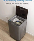 Compact Full Automatic Washing Machine In Sleek Grey with open lid showing honeycomb drum for efficient laundry.