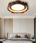 Top Shelf Wood Grain Led Ceiling Light Fixture, Solid Flush Mount With Mid Century Modern Vibe, illuminating a stylish bedroom.