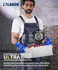 Man wearing premium pvc chemical gloves with sturdy nonslip grip, handling icy box for heavy duty work.