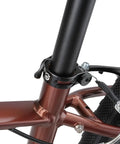 Quick Release Bike Seat Clamp 34.9mm Lightweight Aluminum Seatpost Collar on a brown frame with black finish.