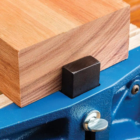7 Inch Quick Release Workbench Vise With Drilled Jaws For Easy Wooden Pad Attachment holding wood with pop up dog