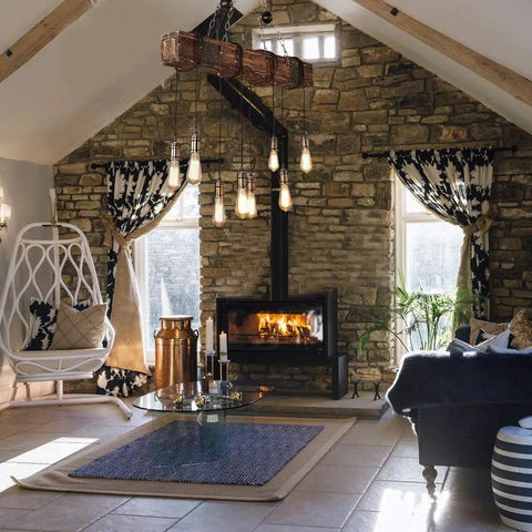 Cozy living room with Rustic Industrial 8-Light Pendant Chandelier for Dining Room and Kitchen Island, vintage style design.