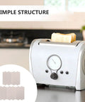Seven Piece Microwave Mica Sheets Heat Resistant Insulation Plates Universal Waveguide Covers next to a toaster on a kitchen counter.