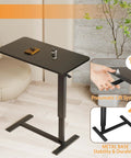 Adjustable Overbed Table With Wheels For Home Use, Extra Large 31.1 Inch By 15.3 Inch Bedside Tray Table, black finish depicted in room