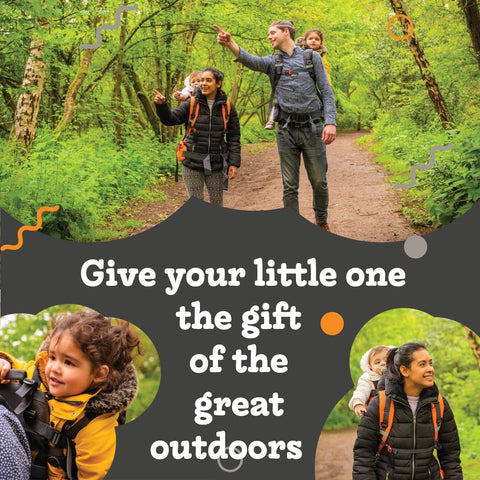 Parents hiking in forest with child in Outdoorsy Hiking Baby Carrier Backpack For Safe Comfortable Toddler And Baby Transport.