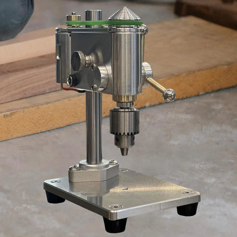 Compact Mini Drill Press For Benchtop Use Portable Clamp Holder Perfect For Jewelry Making And Small Repairs With Universal Chuck Support close-up of aluminum drill press with chuck and stand