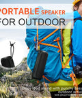 Hiker with backpack featuring Wireless Portable Speaker With 25W Bangin Bass And Bassboom Technology for outdoor use.