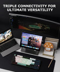 Slick 87 Key Gasket Mount Tenkeyless Mechanical Keyboard Featuring Hot Swappable Switches And Full Spectrum RGB Illumination on a desk with devices.