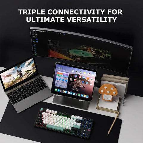 Slick 87 Key Gasket Mount Tenkeyless Mechanical Keyboard Featuring Hot Swappable Switches And Full Spectrum RGB Illumination on a desk with devices.