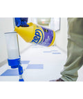 Pouring Heavy Duty Stain Resistant Floor Sealer One Gallon Clear Gloss Coating for easy application in a commercial setting.