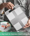 5 Pack 6x6 Inch Large Clear Self Adhesive Silicone Non Slip Pads For Rug To Carpet Gripping And Furniture Stabilization Glass Chair Mat Anti Slip Pads Easy Peel And Remove shown on cutting board