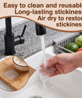 Person washing Non Slip Cutting Board Feet Set 8 Pack 1.6 Inch Self Adhesive Silicone Pads No Screws Needed Washable Reusable