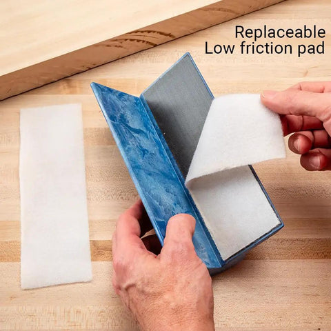 Person replacing pad on PSA Sanding Block With 90 Degree Edge For Woodworking And Auto Body Finishing Hand Sander