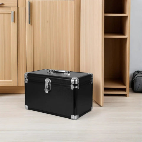 Portable Aluminum Tool Box With Ergonomic Handle And 2 Layer Sealed Clasp For Shock Protection in front of wooden cabinets