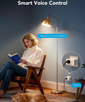 Woman reading by lamp with Real Time Energy Monitoring Smart Plug With WiFi And Bluetooth, Works With Alexa And Google Assistant, 15A Outlet With Timer And Group Control, No Hub Needed, ETL And FCC Certified, Ideal For Home Energy Savings, 4 Pack.