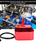 Front view manual hydraulic pressure test pump, 1000 PSI, red unit with gauge and hose for pipe testing