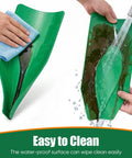 Cleaning the Three Piece Silicone Oil Drain Funnel Set For Spill Free Oil Changes with water and a cloth to show ease of maintenance.