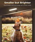 Top Notch Rechargeable Picture Lights Two Pack Museum Quality High Cri Wall Mounted Frame Lamps illuminating a wall picture of a dog.
