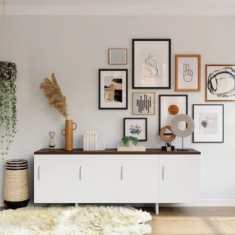 Modern room with art wall, white sideboard, and decor
