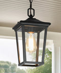 Straight Up Farmhouse Outdoor Pendant Light With Clear Glass Shade And Rust Proof Metal Frame Killing It As A Heavy Duty Hanging Lantern Top Shelf Pick For Porches Entryways And Gazebos In Sleek Matte Black, featuring clear glass and E26 bulb.