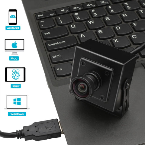 1080P 120FPS High Speed USB Camera With M12 Wide Angle 12MP IMX577 Sensor Lightburn Compatible External Computer Camera next to laptop keyboard