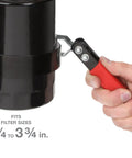 Hand using Self Adjusting Oil Filter Wrench With 180 Degree Flex Head Fits Three And A Quarter To Three And Three Quarters Inch Filters