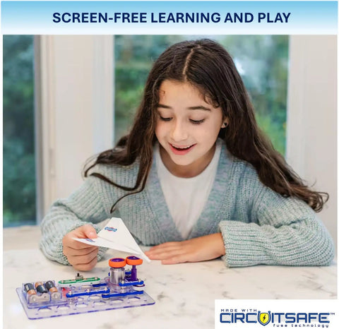 Girl using Flight Deck STEM Toy Kit For Ages 8 Plus Build Simple Circuits That Launch Paper Airplanes at a table