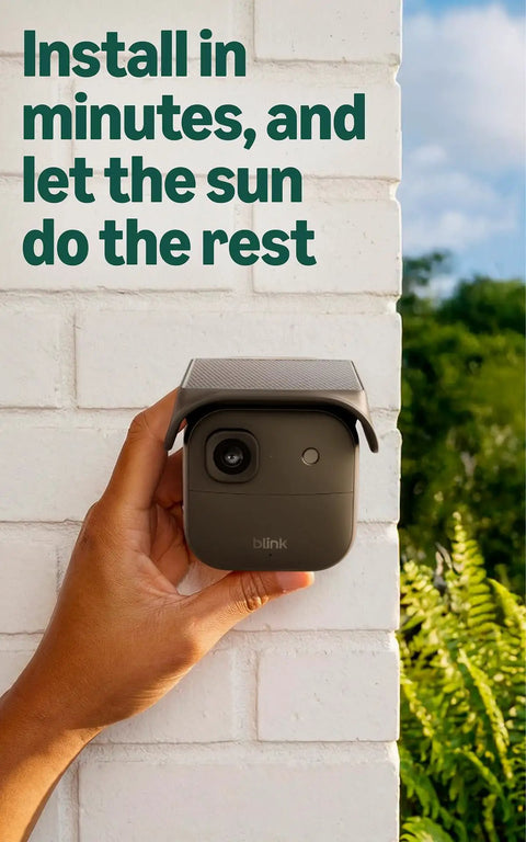 Hand holding Solar Panel Security Accessory For Outdoor 4 And Outdoor 2K Plus Battery Cameras Easy Setup Weather Resistant Solar Power