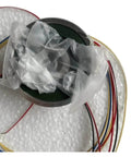 Top view of TS2640N321E64 Servo Motor Encoder wrapped in protective film with multicolored wires for CNC machines and robotics.