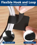Close-up of 50 Pack Hook And Loop Cable Ties For Under Desk Cable Management, black self adhesive clips securing cables.