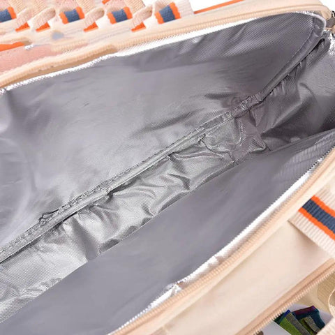 Interior view of No Fuss Insulated Picnic Backpack Set for Four, showing spacious compartment lined with silver insulation.