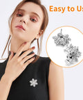 Hella Secure 30 Pack Locking Pin Backs For Sewing Needles on a black shirt, featuring a snowflake design and easy-to-use clasp.