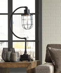 Industrial Metal Desk Lamp With Glass Shade Black Antique Finish Vintage Style Office Light on wooden table near window