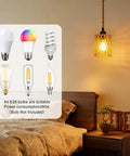 Boho Cylinder Pendant Light Featuring Plug In Flex And Sturdy 15Ft Hemp Rope Plus Handwoven Rattan Shade With Easy Flip Switch For Your Dope Bedroom Lighting Setup hanging above a bedside table with various E26 bulbs.