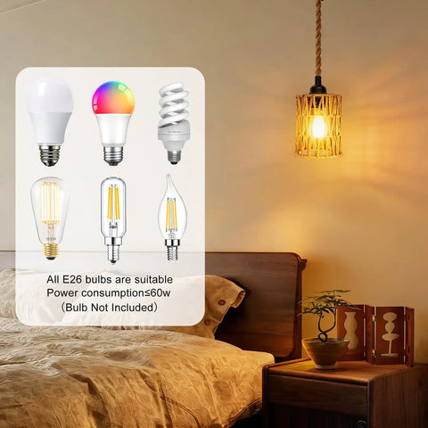Boho Cylinder Pendant Light Featuring Plug In Flex And Sturdy 15Ft Hemp Rope Plus Handwoven Rattan Shade With Easy Flip Switch For Your Dope Bedroom Lighting Setup hanging above a bedside table with various E26 bulbs.