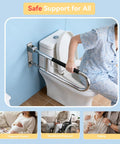 Real Deal 32 Inch Flip Up Toilet Safety Handle In Brushed Nickel Featuring Built In Paper Dispenser And Anti Slip Rubber Knobs Beefy 304 Stainless Steel Construction For Dependable Handicap Assistance And Wheelchair Accessible Restroom Design in use with a person holding on for support.
