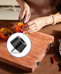 Close-up of a cutting board with Grippy Rubber Feet Bumpers Kit with Built In Stainless Washers and Screws for Furniture and Appliances.