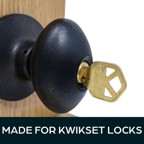 Brass lockout key inserted in Kwikset door lock for quick outside locking, ideal for evictions, emergencies, and privacy on rental properties.
