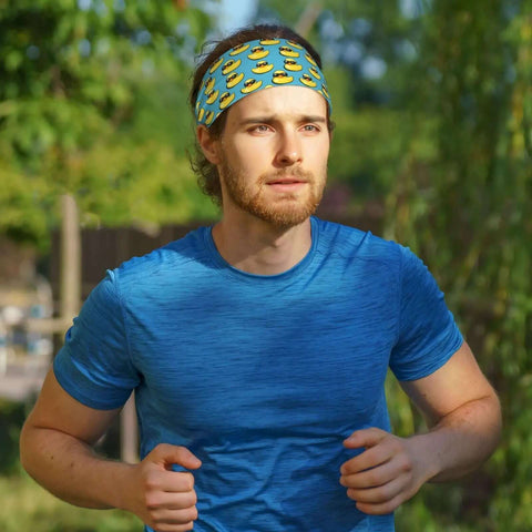 Man jogging wearing Sunglasses Print Headbands For Women And Men Moisture Wicking Sweat Bands For Running Gym Workouts