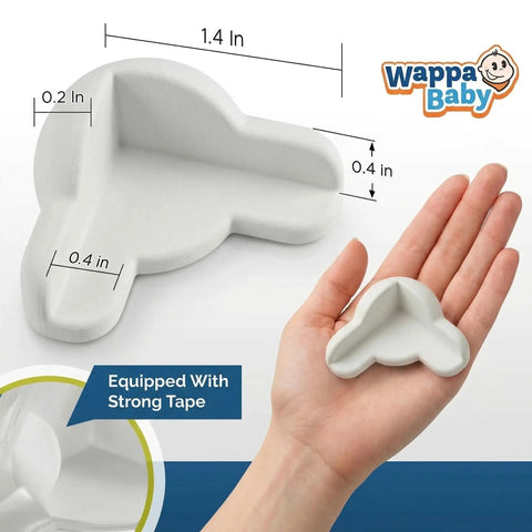 Tot Approved Silicone Corner Protectors For Baby Proofing Tables And Desks Using Heavy Duty Peel And Stick System To Cushion Hard Hits And Shield Rowdy Kids From Sharp Edges In Crisp White 12, shown in hand for size comparison.