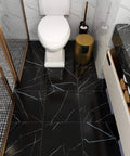 Bathroom showing Peel And Stick Floor Tile 12x12 Inch Vinyl Marble Black Flooring, 16 Pack, Easy DIY Install, no grout needed.