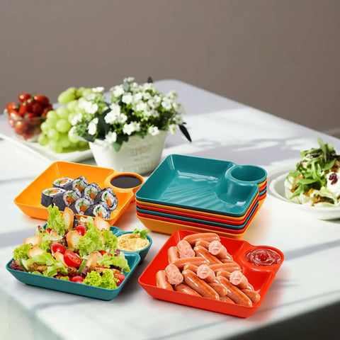 12 Piece Chip and Dip Serving Platter Set BPA Free Plastic Snack Trays With Built In Sauce Compartments, colorful trays with sushi and salad.