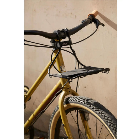 Bicycle with Jack The Bike Rack Front Rack Black Universal Fit Tool Free Install With Patented Strap System, mounted over front wheel.