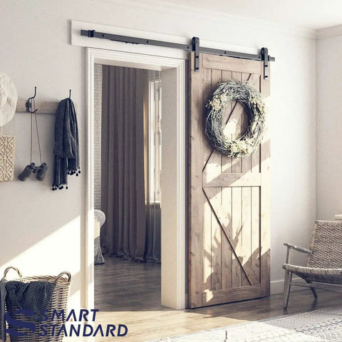 Soft Close Barn Door Hardware Kit For 42 Inch Door Fits 5 To 10 Feet Track In Two Solid Pieces For Quiet Smooth Sliding And No Fuss Install With Step By Step Instructions J Shape Track installed in living room.